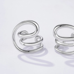 Ear Cuff ατσάλινο ασημί με ανόμοιες καμπύλες